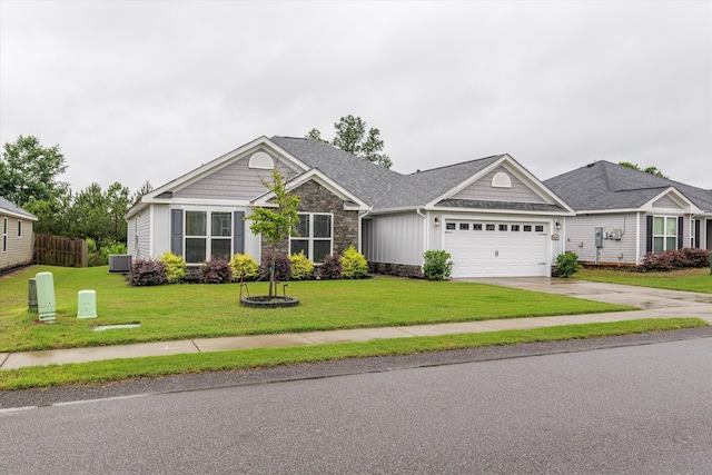 4894 Fairmont Dr, Graniteville, SC 29829 - view of front of property with stone siding, an attached garage, driveway, and central air condition unit
