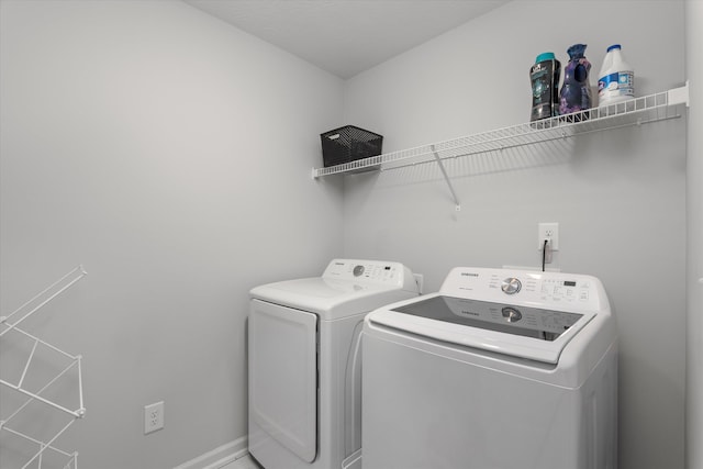 4894 Fairmont Dr, Graniteville, SC 29829 - laundry area featuring washer and clothes dryer and baseboards