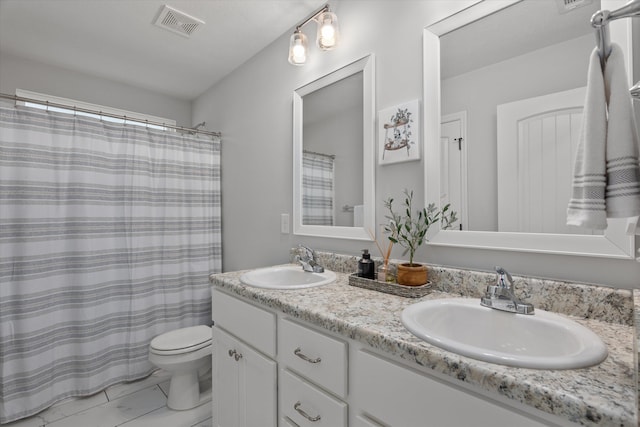 4894 Fairmont Dr, Graniteville, SC 29829 - full bathroom with double vanity, toilet, marble finish flooring, and a shower with shower curtain