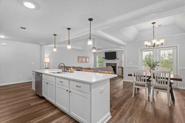 4894 Fairmont Dr, Graniteville, SC 29829 - kitchen with a fireplace, dark wood-style floors, a sink, ceiling fan, and a center island with sink