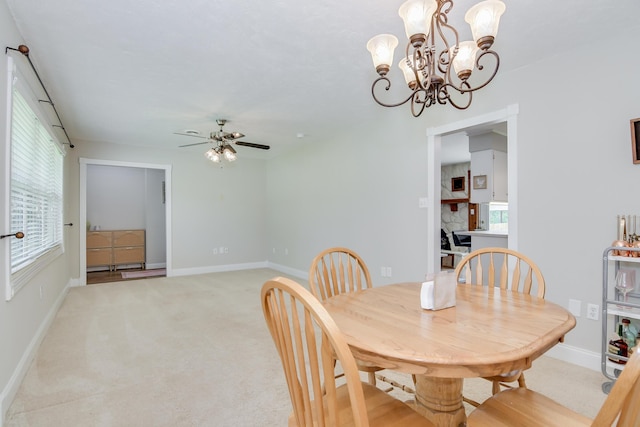3202 Norris Ct, Augusta, GA 30907 - dining space featuring ceiling fan, light carpet, baseboards, and a chandelier