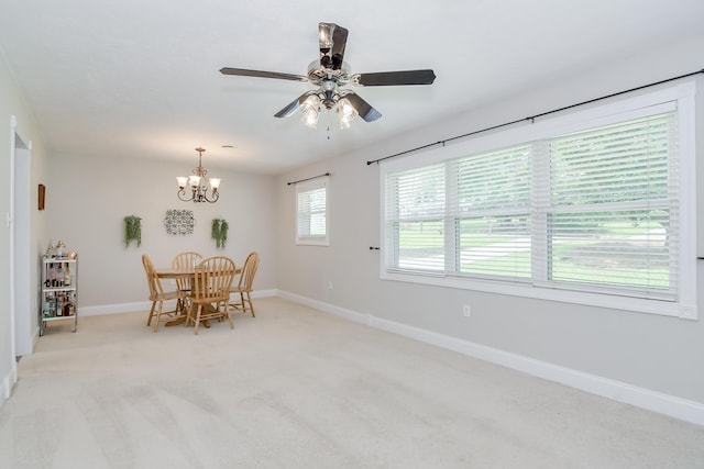 3202 Norris Ct, Augusta, GA 30907 - dining room with baseboards, light colored carpet, a chandelier, and ceiling fan