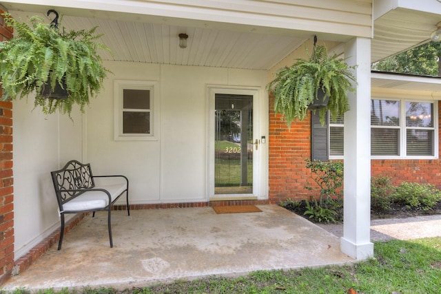 3202 Norris Ct, Augusta, GA 30907 - property entrance with brick siding and a patio
