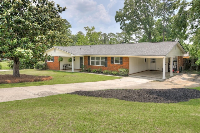 3202 Norris Ct, Augusta, GA 30907 - single story home with brick siding, concrete driveway, an attached carport, and roof with shingles