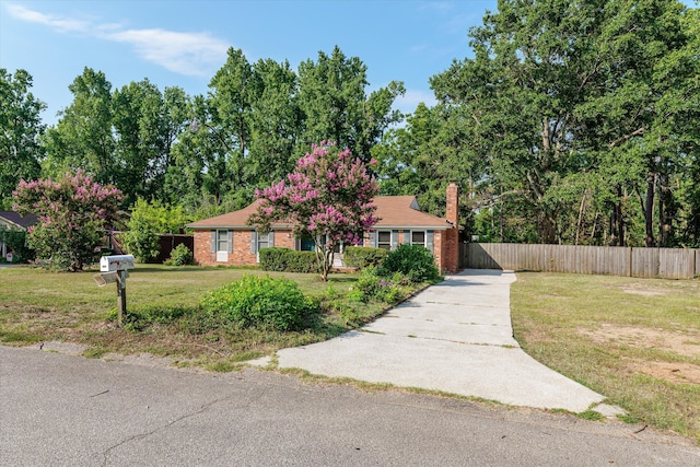 464 Rachel Dr, Evans, GA 30809 - view of front of home featuring driveway, a chimney, and brick siding