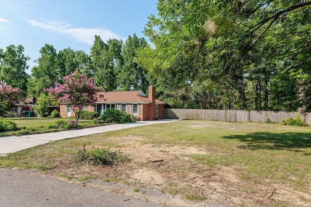 464 Rachel Dr, Evans, GA 30809 - view of front of property with concrete driveway, a chimney, a carport, and brick siding