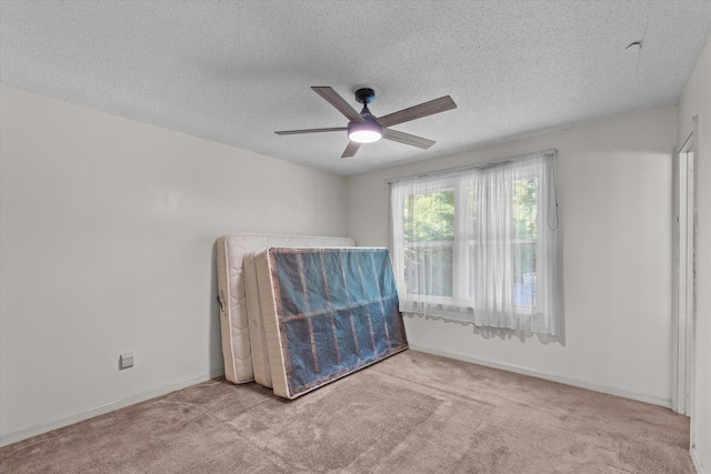 464 Rachel Dr, Evans, GA 30809 - spare room featuring carpet, ceiling fan, and a textured ceiling