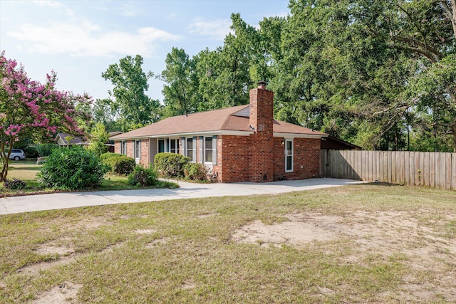 464 Rachel Dr, Evans, GA 30809 - view of front facade with brick siding, a chimney, and concrete driveway