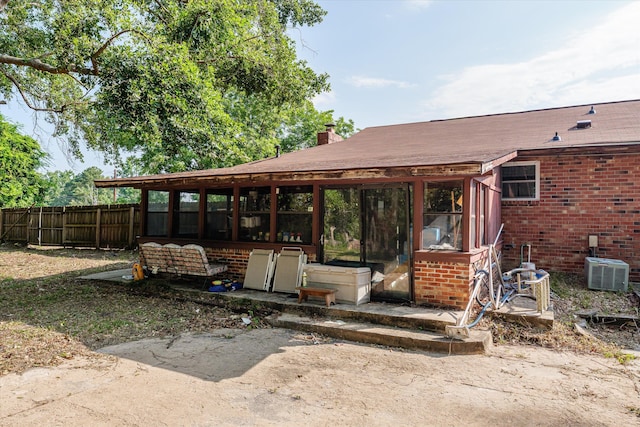 464 Rachel Dr, Evans, GA 30809 - rear view of property featuring brick siding and a chimney