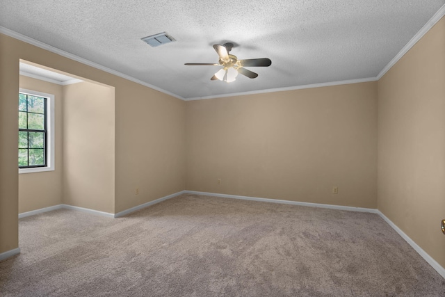 spare room with light carpet, ceiling fan, and ornamental molding