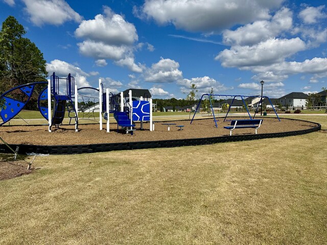 view of jungle gym with a yard