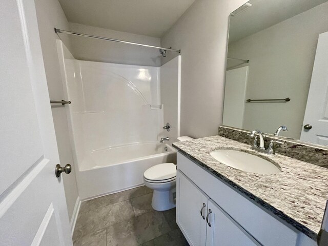 full bathroom featuring vanity, bathing tub / shower combination, and toilet