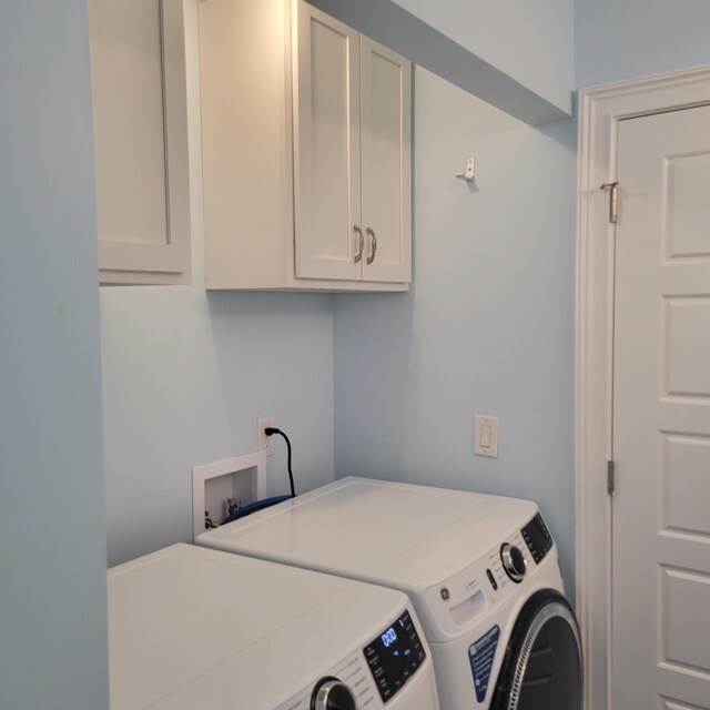 3597 Parliament Pl, Martinez, GA 30907 - laundry room with cabinet space and separate washer and dryer