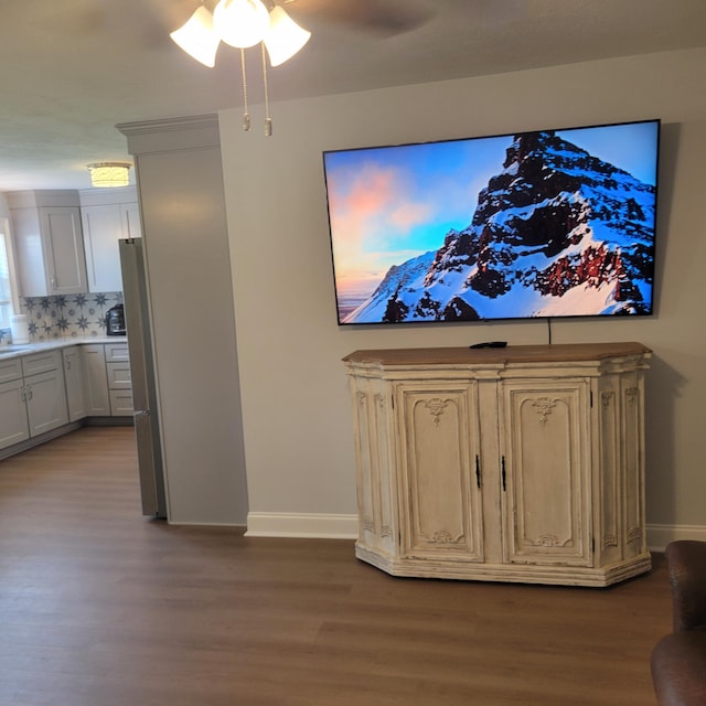 3597 Parliament Pl, Martinez, GA 30907 - living area featuring wood finished floors and a ceiling fan