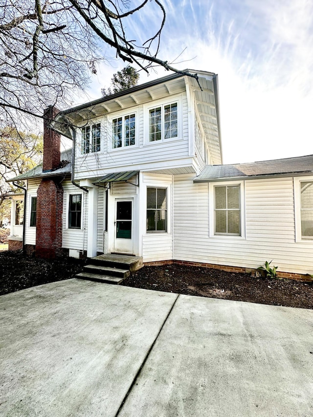 view of front facade with a patio