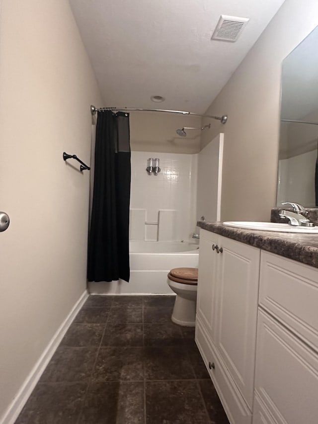 full bathroom with vanity, shower / bath combination with curtain, and toilet