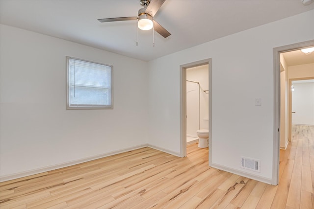 2426 Dickey Rd, Augusta, GA 30906 - unfurnished bedroom featuring light wood-type flooring, ensuite bathroom, and ceiling fan