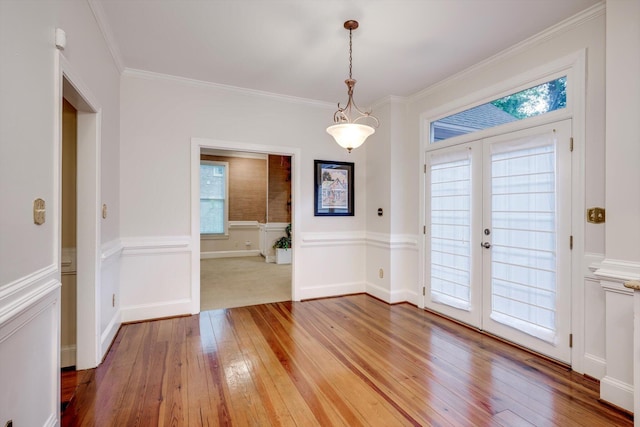 615 Stevens Xing, Augusta, GA 30907 - unfurnished dining area featuring light wood-style flooring, french doors, and crown molding