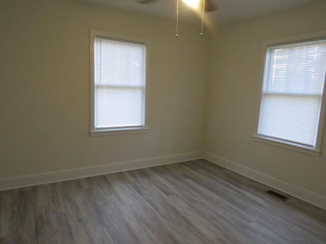 2072 Battle Row, Augusta, GA 30904 - empty room with wood finished floors and a ceiling fan
