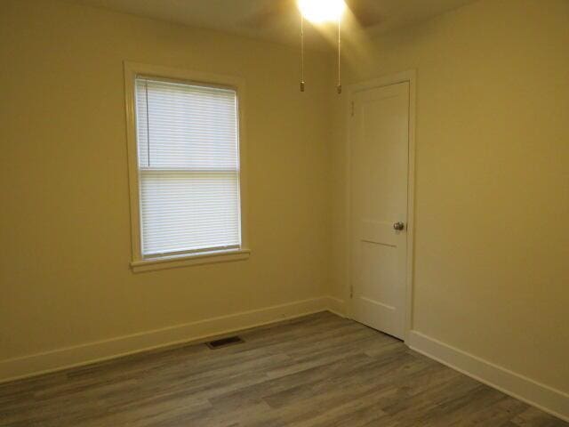 2072 Battle Row, Augusta, GA 30904 - empty room with a ceiling fan and wood finished floors
