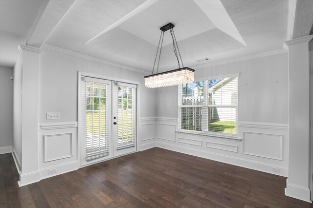 5174 Copse Dr, Augusta, GA 30909 - unfurnished dining area with dark wood finished floors, wainscoting, ornate columns, a decorative wall, and a tray ceiling