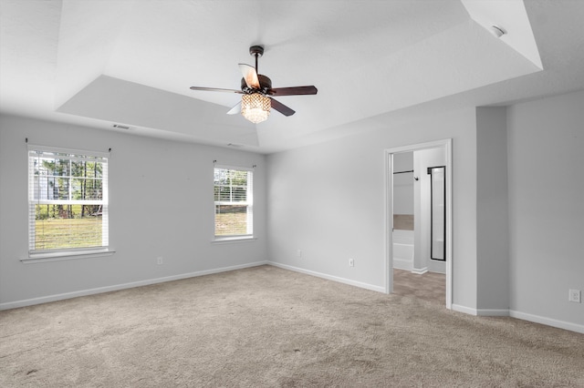 5174 Copse Dr, Augusta, GA 30909 - carpeted empty room featuring a ceiling fan and a raised ceiling