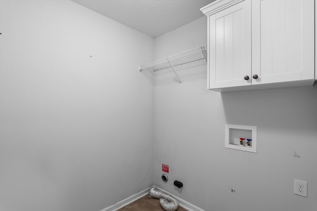 5174 Copse Dr, Augusta, GA 30909 - laundry area featuring cabinet space, hookup for a washing machine, electric dryer hookup, and wood finished floors