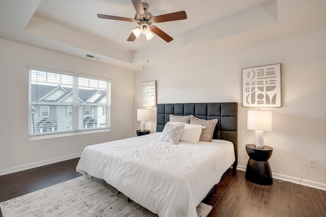 2178 River Park Ct, Augusta, GA 30907 - bedroom featuring a tray ceiling, wood finished floors, and ceiling fan