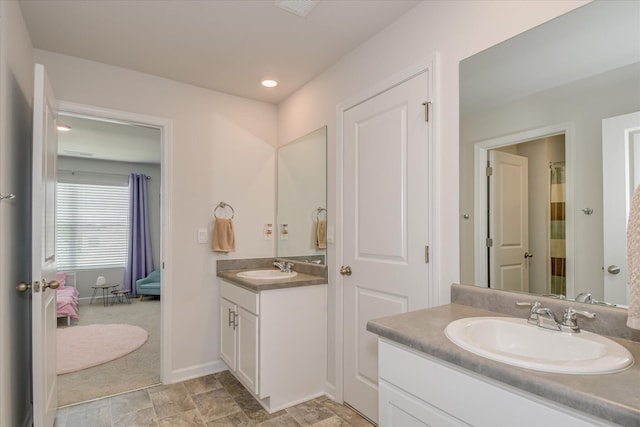 427 Roebuck Pass, Grovetown, GA 30813 - full bath with two vanities, stone finish flooring, baseboards, and recessed lighting