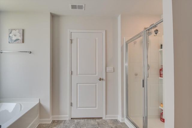 427 Roebuck Pass, Grovetown, GA 30813 - full bath with a shower stall, a garden tub, and baseboards