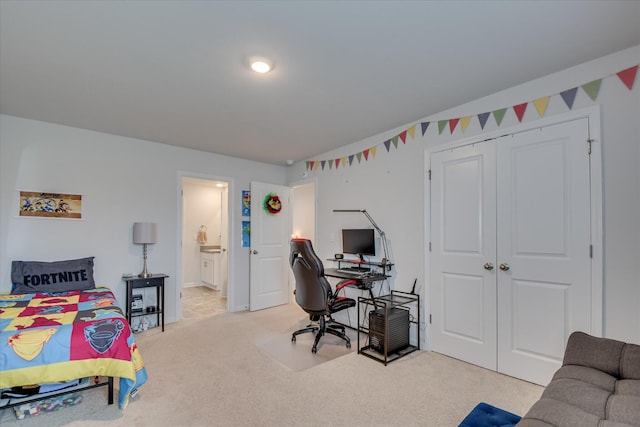 427 Roebuck Pass, Grovetown, GA 30813 - bedroom with light carpet, a desk, a closet, and ensuite bathroom
