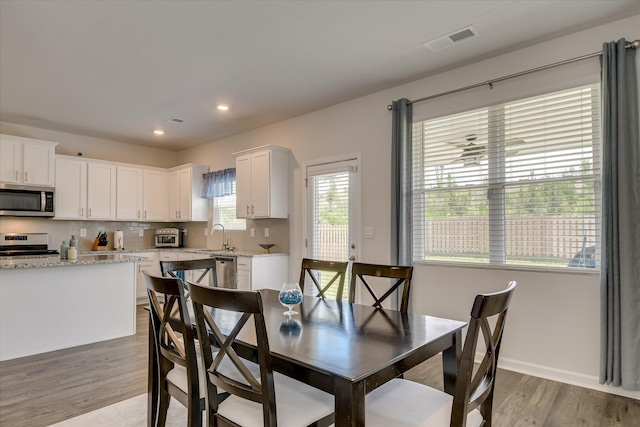 427 Roebuck Pass, Grovetown, GA 30813 - dining area with light wood-style floors, recessed lighting, and baseboards