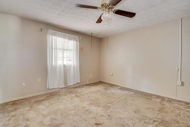 2514 Lumpkin Rd, Augusta, GA 30906 - carpeted spare room featuring visible vents, baseboards, a ceiling fan, and a textured ceiling