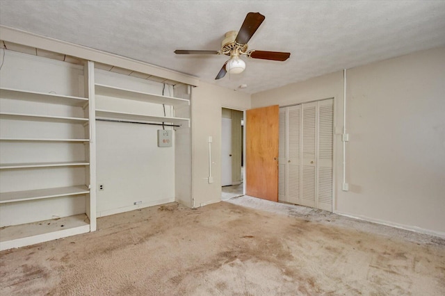 2514 Lumpkin Rd, Augusta, GA 30906 - unfurnished bedroom featuring carpet, baseboards, multiple closets, and ceiling fan