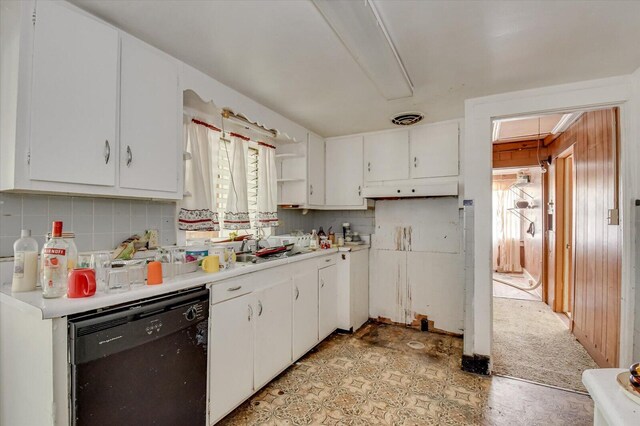 2514 Lumpkin Rd, Augusta, GA 30906 - kitchen featuring visible vents, black dishwasher, light countertops, white cabinetry, and backsplash