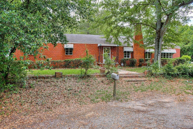 2514 Lumpkin Rd, Augusta, GA 30906 - ranch-style home featuring a chimney and brick siding