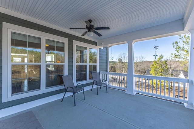 view of patio featuring a ceiling fan