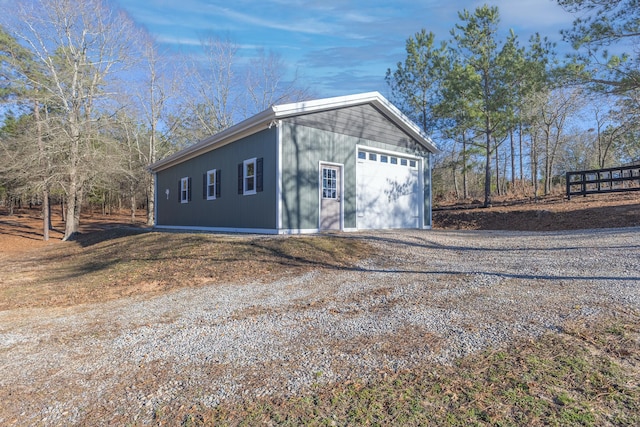 view of outbuilding with an outbuilding and driveway