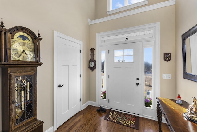 entrance foyer featuring dark wood-style floors and baseboards