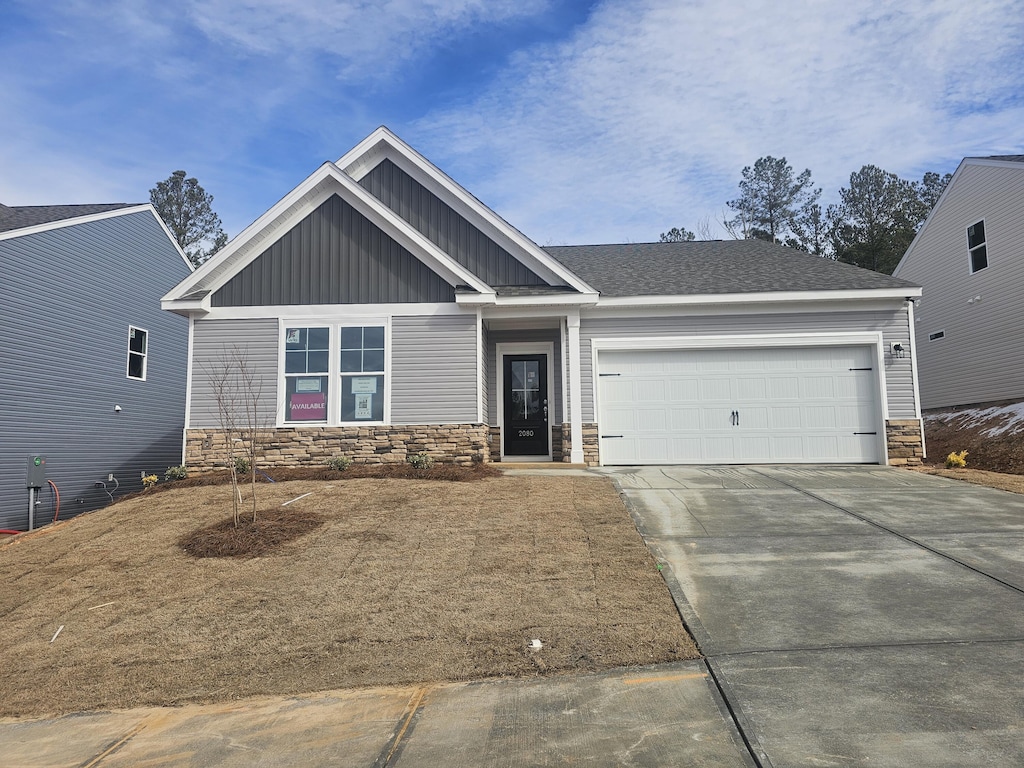 craftsman house with a garage