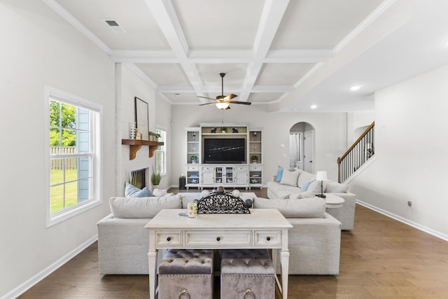 4136 Buffalo Trl, Evans, GA 30809 - living room featuring arched walkways, ceiling fan, beam ceiling, dark wood finished floors, and coffered ceiling