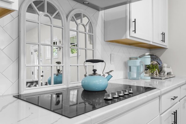 4136 Buffalo Trl, Evans, GA 30809 - bar featuring black electric cooktop and backsplash