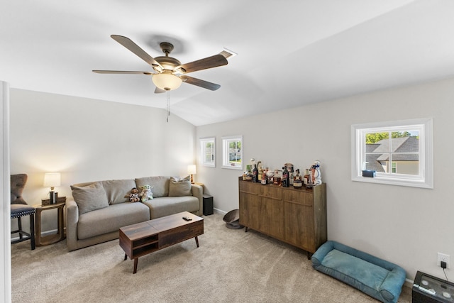 4136 Buffalo Trl, Evans, GA 30809 - living room with ceiling fan, plenty of natural light, light carpet, and vaulted ceiling