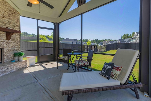 4136 Buffalo Trl, Evans, GA 30809 - sunroom / solarium featuring ceiling fan, vaulted ceiling, plenty of natural light, and a residential view