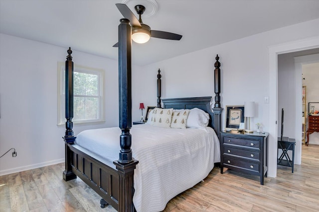 bedroom featuring ceiling fan and light hardwood / wood-style floors