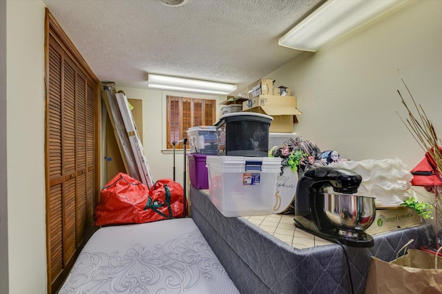 interior space with a textured ceiling