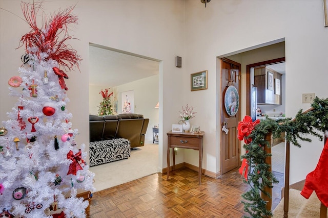 foyer entrance with parquet flooring