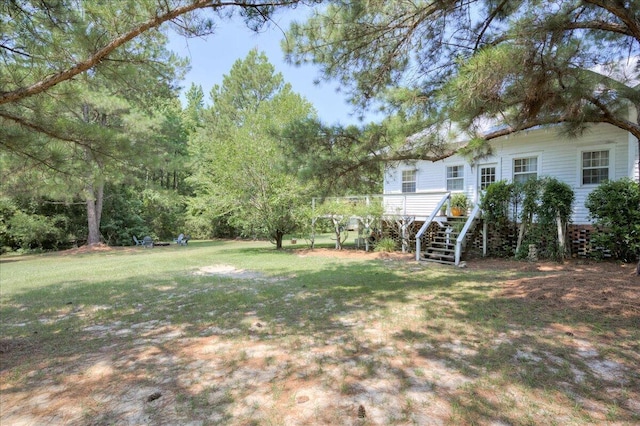 view of yard featuring stairs