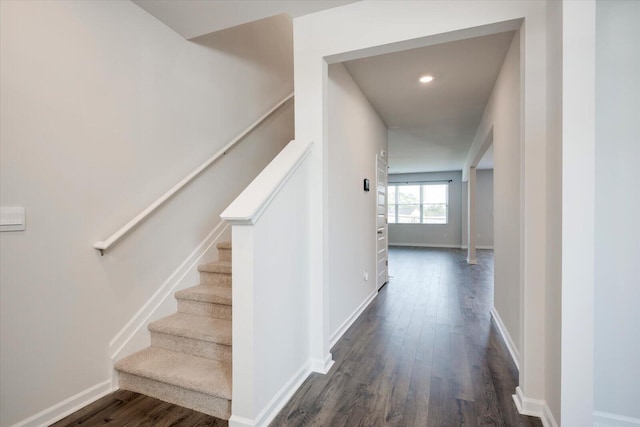 stairway with wood-type flooring