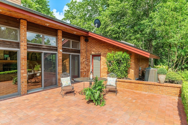 view of patio featuring cooling unit